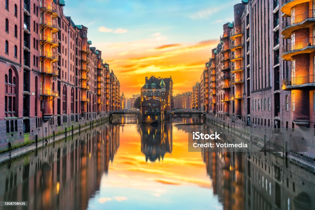 Water castle and storage city in Hamburg, Germany Wasserschloss and Speicherstadt in the Hafencity warehouse district in Hamburg, Germany Hamburg - Germany Stock Photo