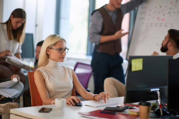 istock Young focused woman working. businesswoman working on computer 1308711068
