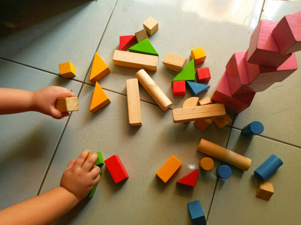 istock the child is playing with blocks 1308712516