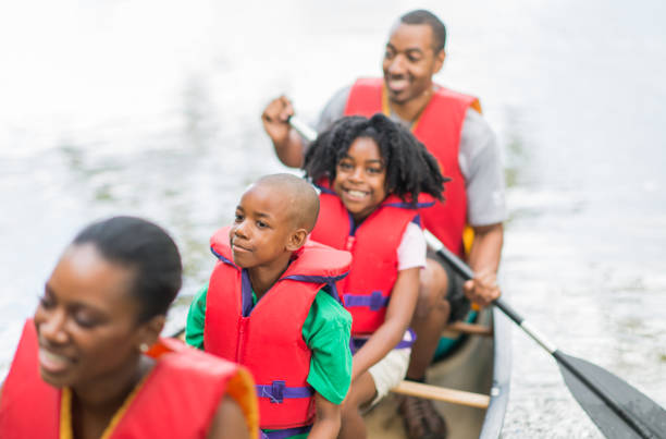 istock Family Canoe Trip In The Summer 1308717437