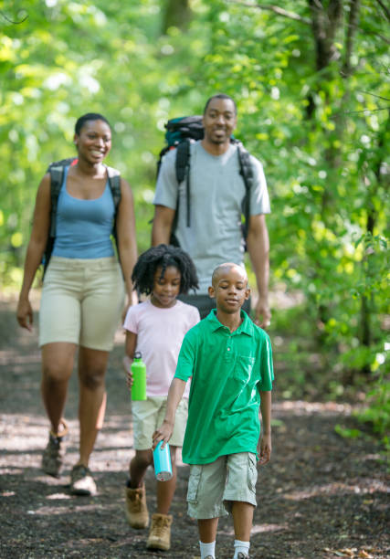 istock African Family Hiking Outdoors Together 1308717446