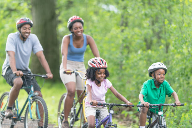 istock African Family Biking Outdoors Together 1308717454