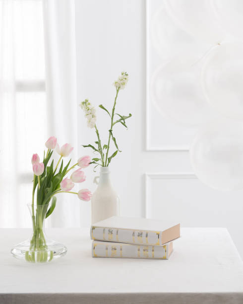istock Beautiful Books and flowers on table 1308718803