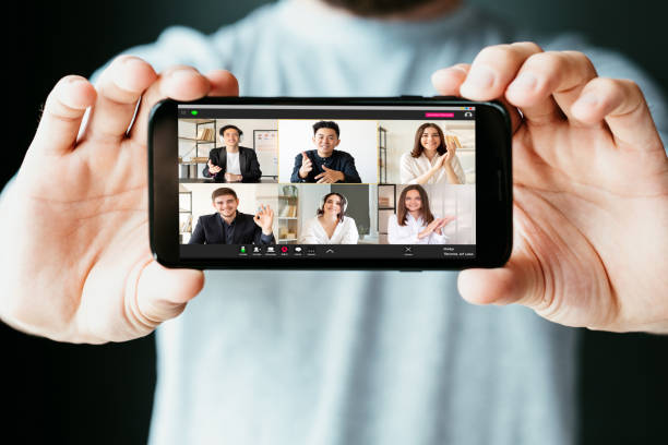 istock video conference virtual meeting team mobile phone 1308718863