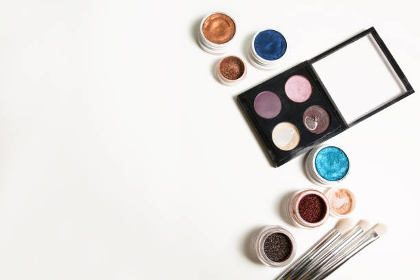 istock Professional makeup palette, cream eyeshadow and brushes on a white background. Space for text 1308719686