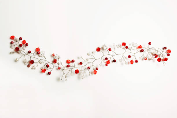 Nice hair accessory with white and red beads on a white background
