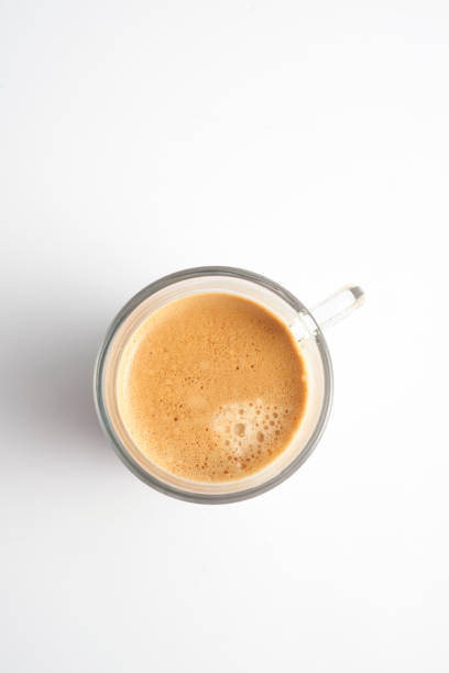 istock Hot coffee in glass mug on white background 1308721033