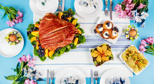 istock Festive Easter table with ham, salad and pancakes. 1308721356