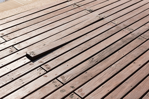 Damage Wooden deck on side of swimming pool