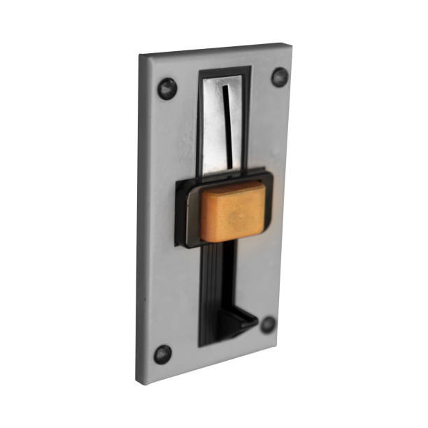 istock Old coin receptacle slot panel from a coin operated machine isolated on white 1308722912