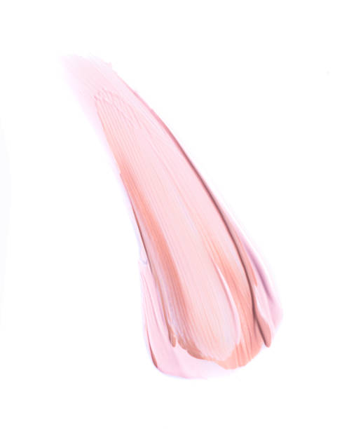 istock Pink color tone make up base in abstract shape on white background 1308723565