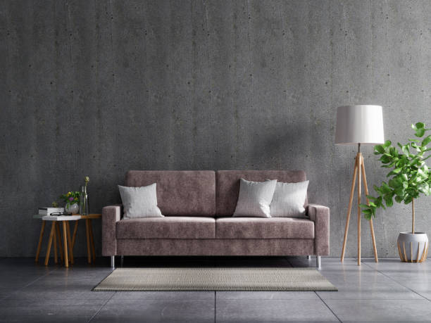 istock Concrete wall living room with sofa and decoration. 1308740187