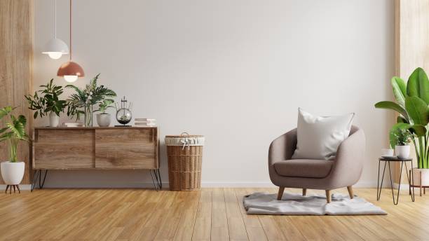 istock Modern minimalist interior with an armchair on empty white wall background. 1308740214