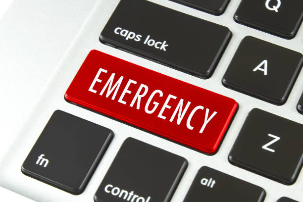 Emergency word on Computer Keyboard Keys Emergency word on Computer Keyboard Keys emergency response workplace stock pictures, royalty-free photos & images