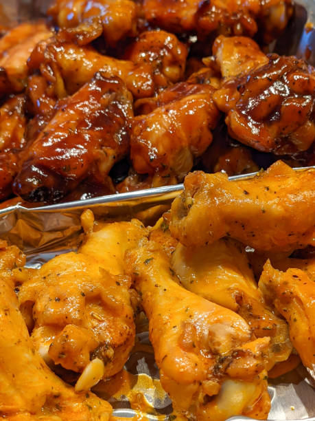 istock Chicken wings are being cooked in the oven 1308740753