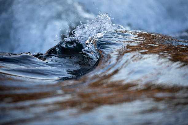 istock river water flowing with light reflecting of its surface 1308765457