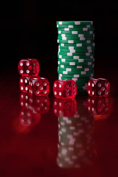 istock Group of gambling chips and red dice 1308771363