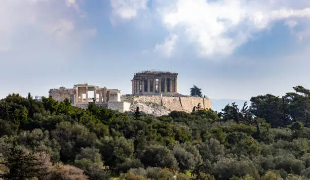 Acropolis rock view from Filopappou hill, Athens, Greece. Historic landmark. Unesco World Heritage ancient, historic, classical archeological monument background. Destination, holiday, tourism Greece.