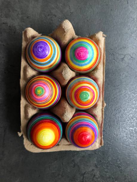 istock Beautifully colorful striped Easter eggs 1308779825