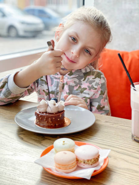 istock Little girl in a cafe 1308786768