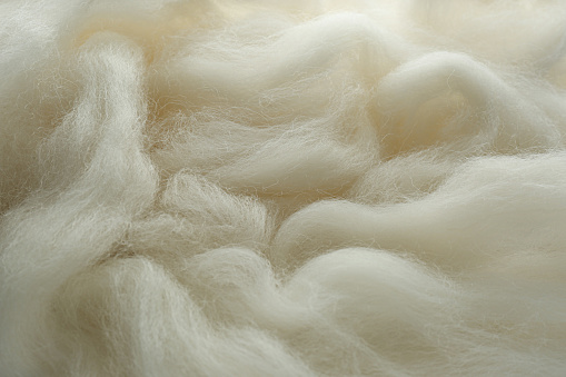 Textura suave de lana blanca como fondo, primer plano photo