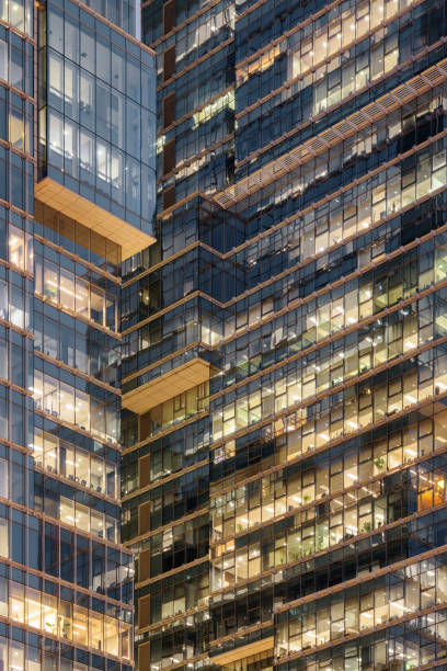 istock Scenic glowing windows of skyscrapers. Modern office buildings 1308792066