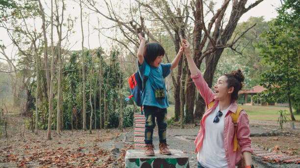 Mother with children on the playground