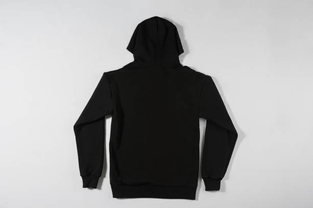 istock Black hoodie on grey background 1308793710