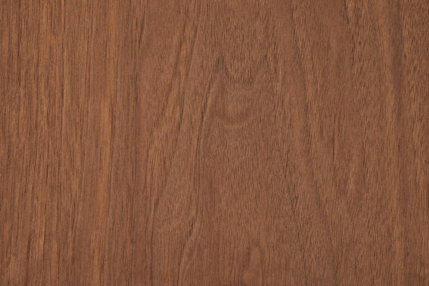istock dark brown wood texture, old walnut boards. wooden panel background 1308794900