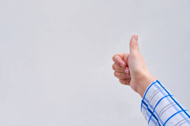 hand with thumbs up on a background