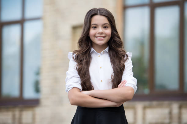 istock Dedicated to learning. Confident lyceum student keep arms crossed outdoors. Happy child study in lyceum. Back to school. Secondary education. Private and public lyceum. Knowledge day. September 1 1308801904