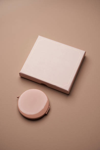 istock Cosmetics makeup powder background, top view 1308808429
