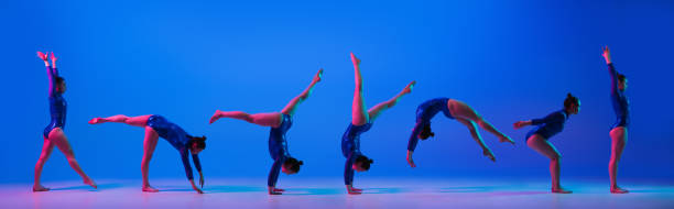 istock Young flexible girl on blue studio background practicing artistic gymnastics. Sport art collage, flyer with ad. Exercises for flexibility, balance. 1308820623