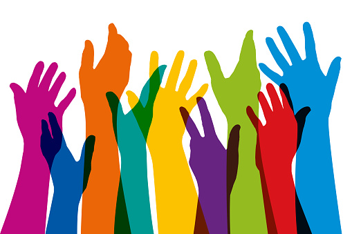 Concept of the cohesion of a group, with silhouettes of raised hands of different colors, to symbolize union and diversity.