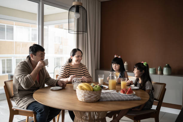 istock Family at home taking breakfast together 1308829898