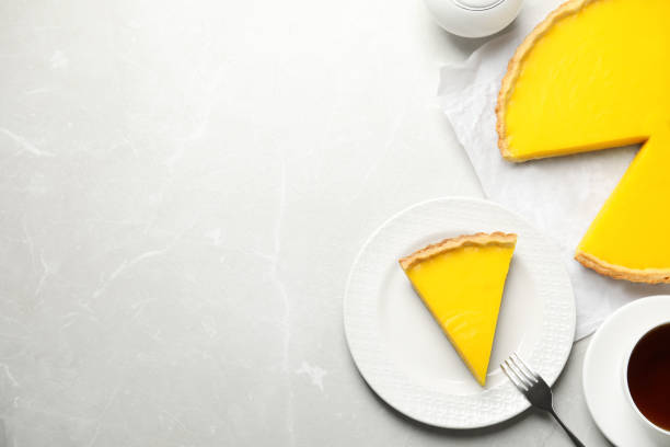 istock Delicious homemade lemon pie on light grey marble table, flat lay. Space for text 1308830226