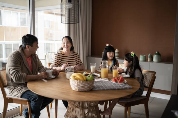 istock Family at home taking breakfast together 1308830655