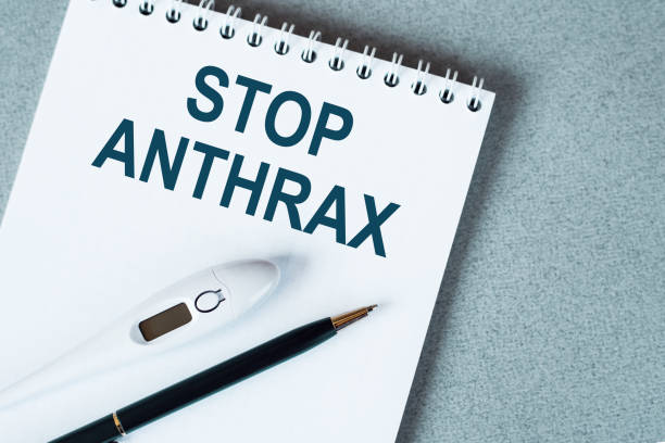 istock On a purple background a stethoscope with yellow list with text STOP ANTHRAX 1308832045