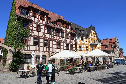 People visit Marktplatz (also known as Gruner Markt) in Furth, Germany. It is a major town in Middle Franconia, more than 1000 years old.