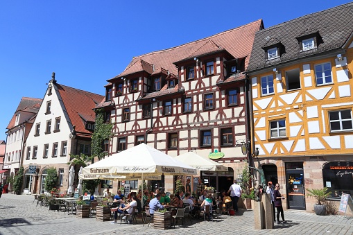 People visit Marktplatz (also known as Gruner Markt) in Furth, Germany. It is a major town in Middle Franconia, more than 1000 years old.