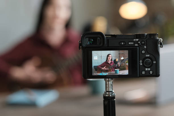 istock Woman recording herself on camera 1308838739