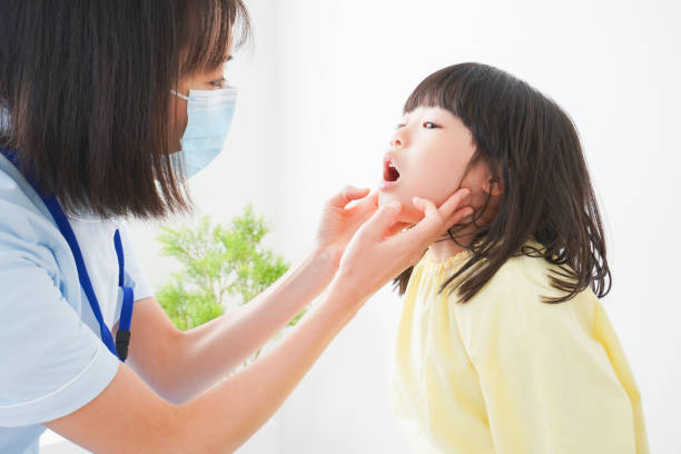 istock A little girl being treated by a dentist 1308840831