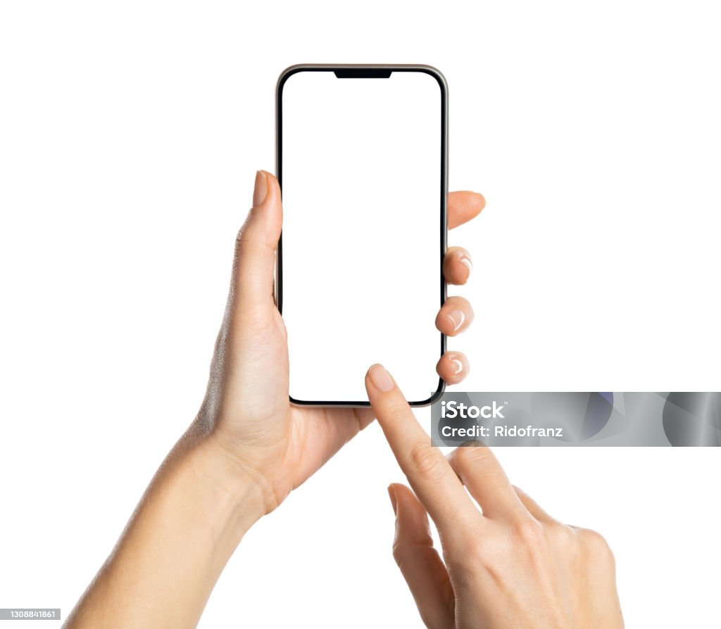 Woman hand using smartphone isolated on white background Female hands holding modern cellphone against white background. Close up of woman hands holding smart phone with blank screen in hand. Empty smartphone white screen ready for your app to be placed isolated on white background. Hand Stock Photo
