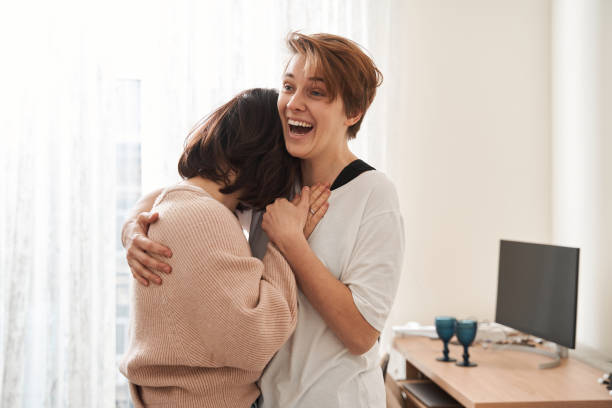 istock Couple laughing with each other and showing true emotions while dancing 1308843024