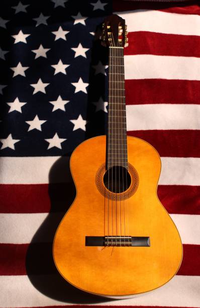 istock Guitar on American Flag Background 1308844991