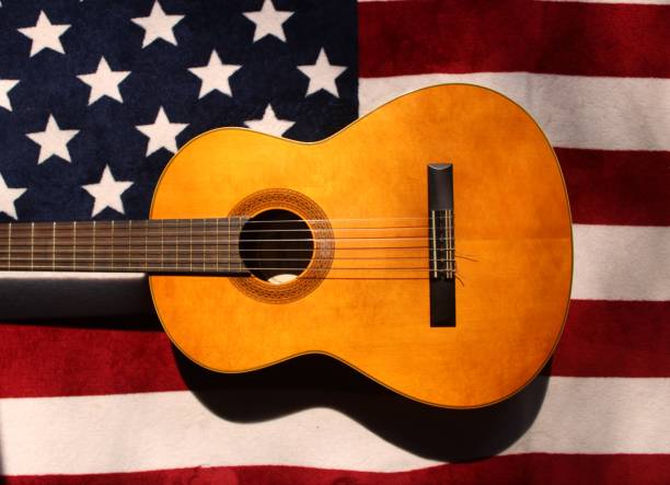 istock Guitar on American Flag Background 1308845025