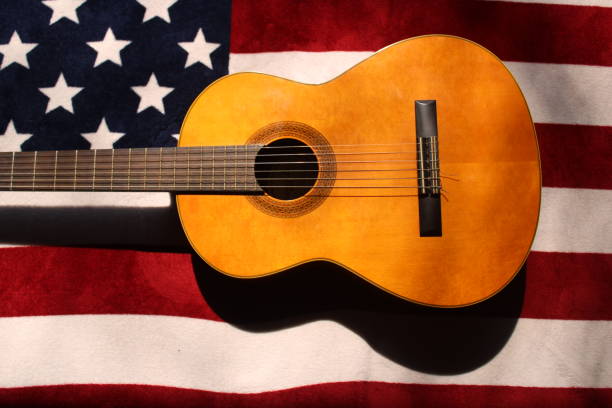istock Guitar on American Flag Background 1308845089