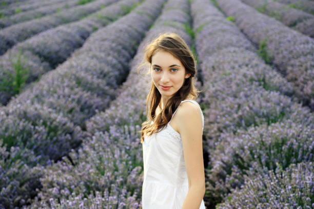 istock Young girl in lavender field 1308848945