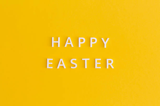 istock Happy Easter lettering on a yellow background 1308849638