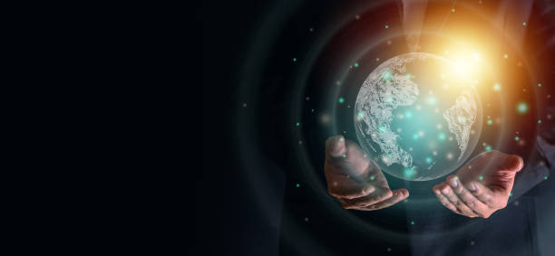 istock Man's hands holding virtual digital earth planet with light and graphic decoration. Save earth concept. Global connection technology concept. Graphic design for background and banner. 1308849901